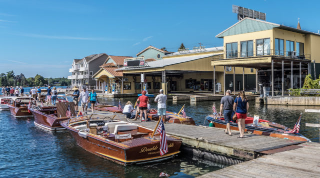 People and boats at docks